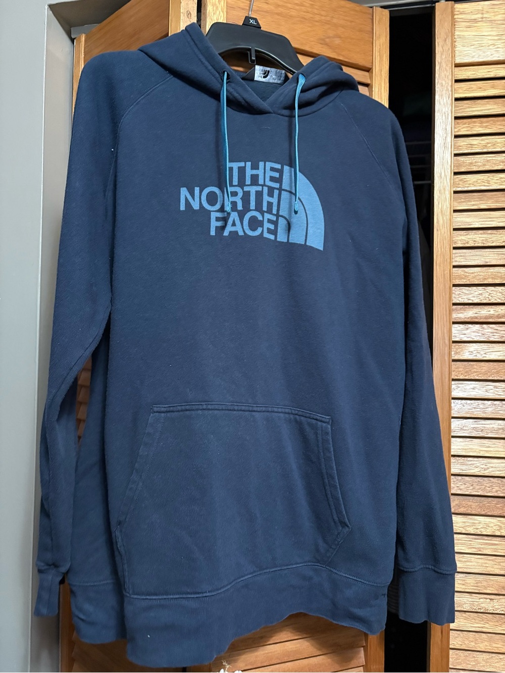 The North Face Navy Pullover Hoodie with Light Blue Logo